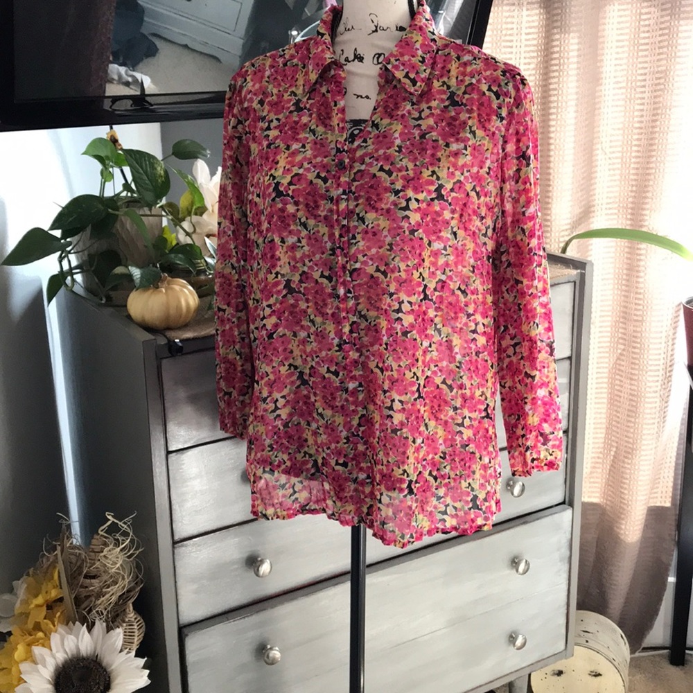Pretty sheer pleated blouse.
